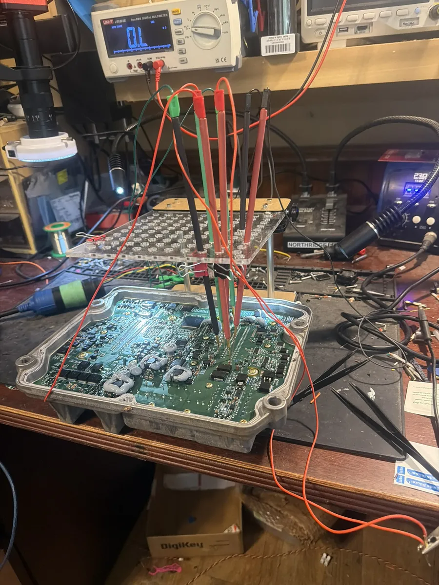 A Cummins CM2350A Tier 4 Final engine controller on the bench, tested with Calterm and INSITE after a repair.